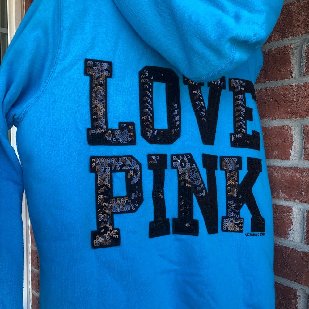 “Pink” furry blue sweater
